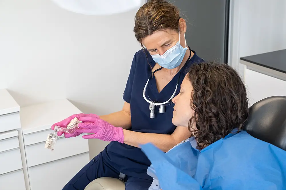 Beratung Zahnarzt Zürich Patient Gespräch